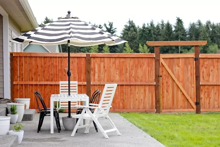 40 Budget-Friendly DIY Backyard Projects to Create Your Dream Outdoor Space Place Your Umbrella in a Plant Pot