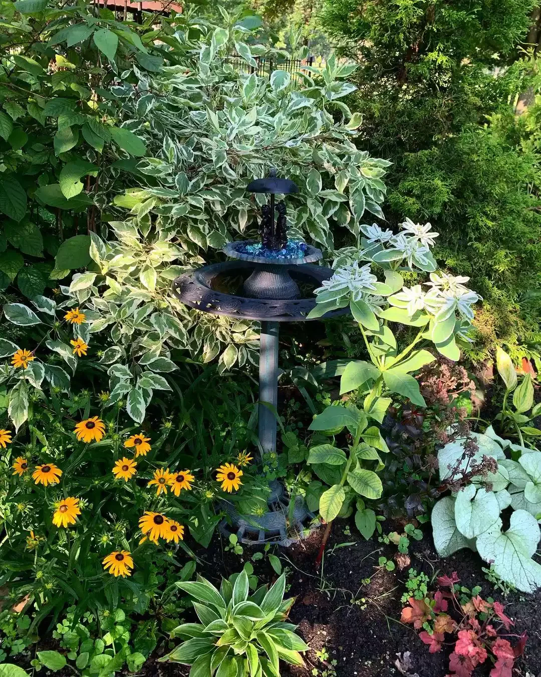35 Enchanting Cottage Garden Ideas That Transform Your Outdoor Space Into a Magical Retreat Place a Beautiful Bird Bath
