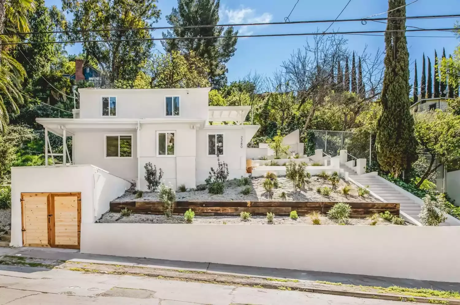 15 Creative Sloped Backyard Transformations That Maximize Your Outdoor Space Plant a Tiered Garden