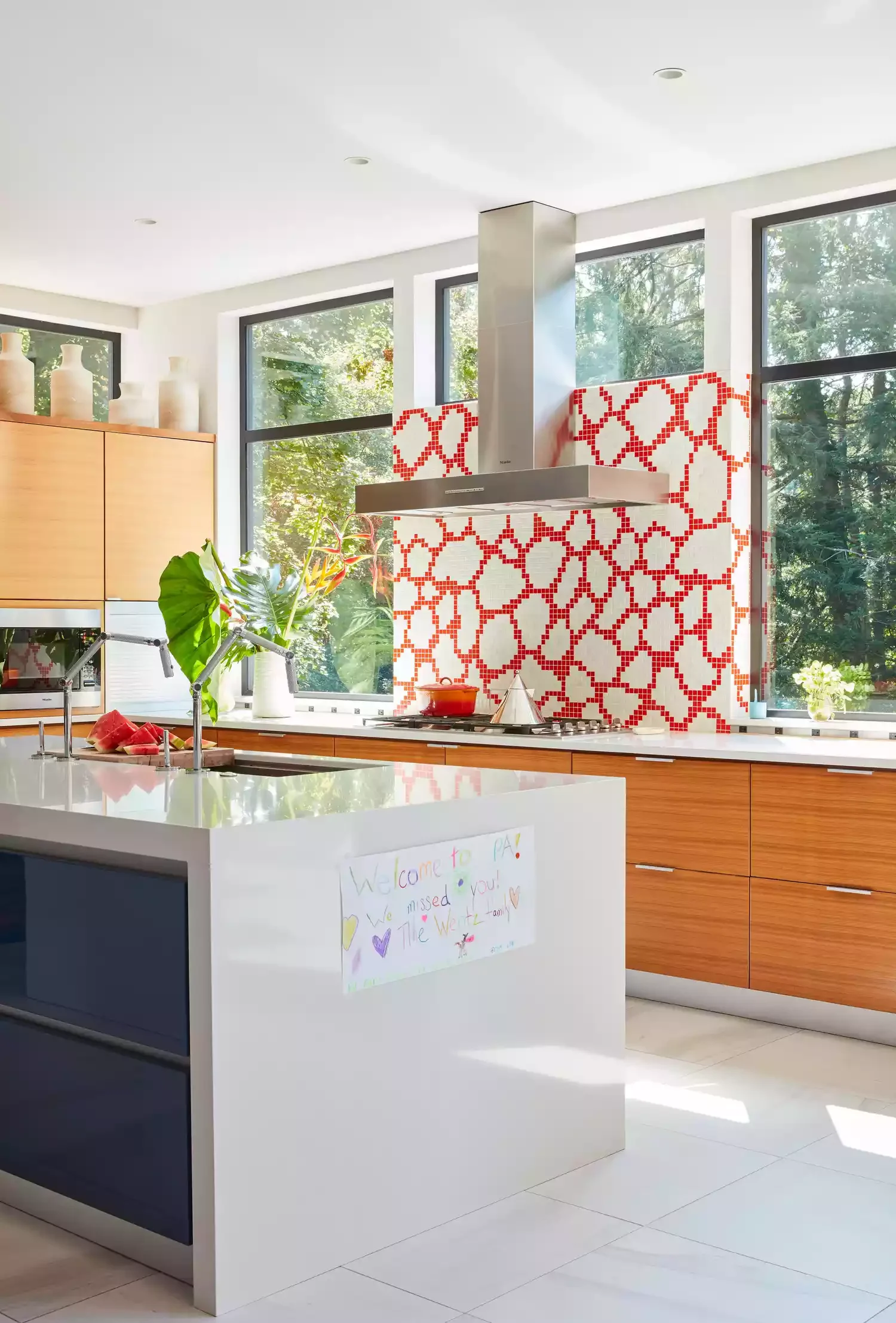 30 Stunning Range Hood Designs That Transform Your Kitchen 20 Play Off a Bold Backsplash