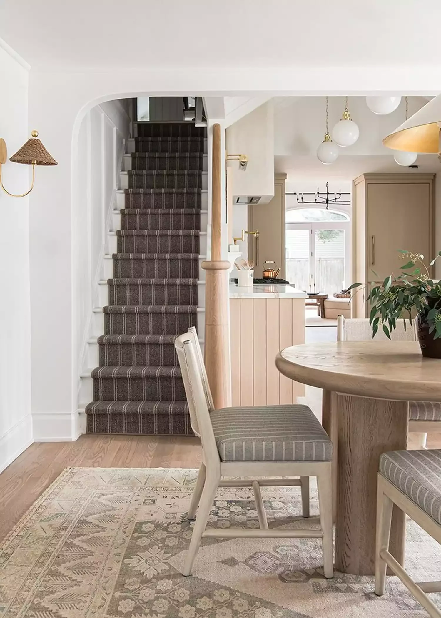 32 Staircase Design Ideas That Transformed Homes This Year Play Off an Existing Motif