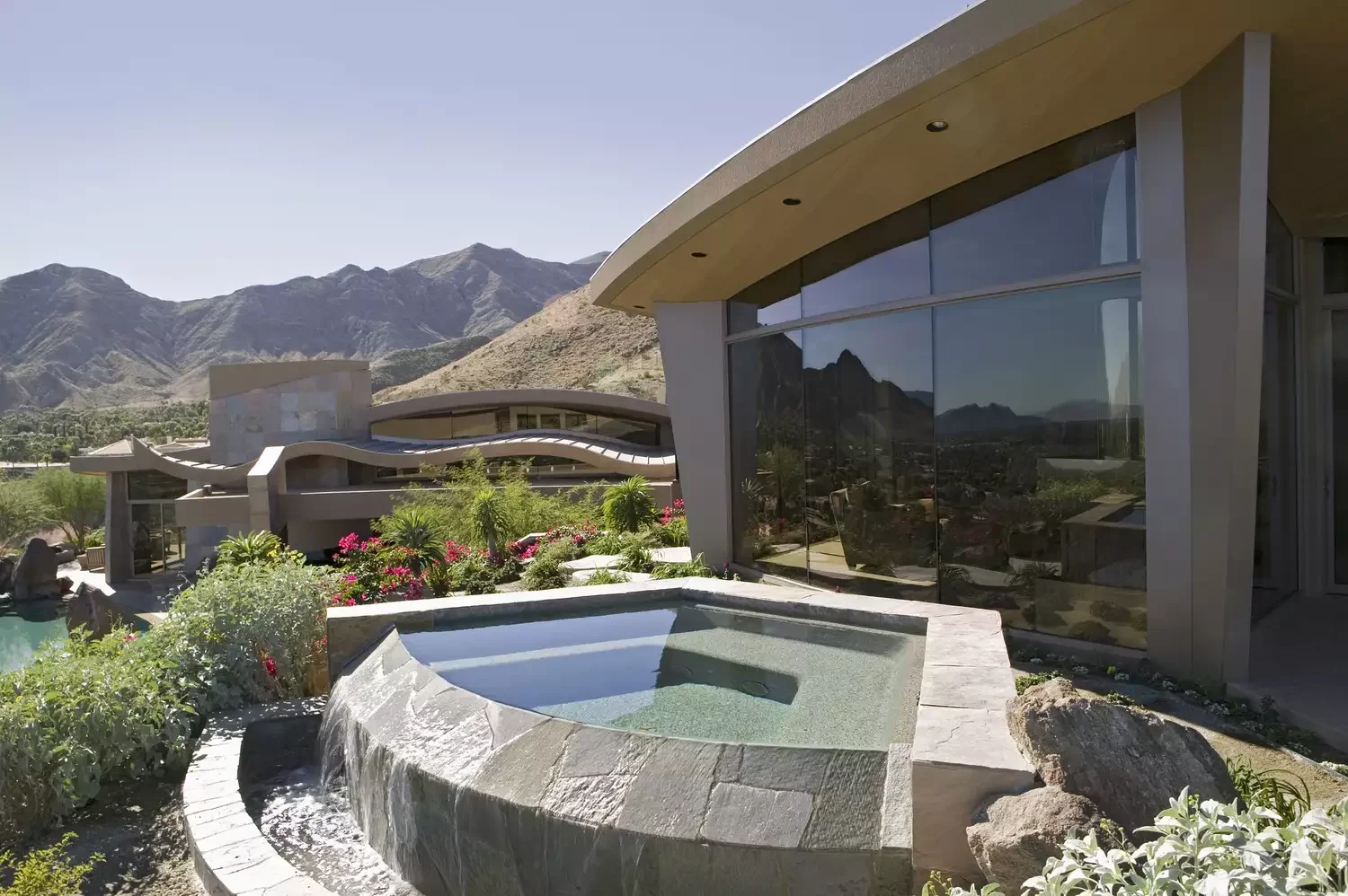 37 Stunning Plunge Pool Designs to Transform Your Backyard Into a Cool Summer Retreat 35 Plunge Pool Waterfall