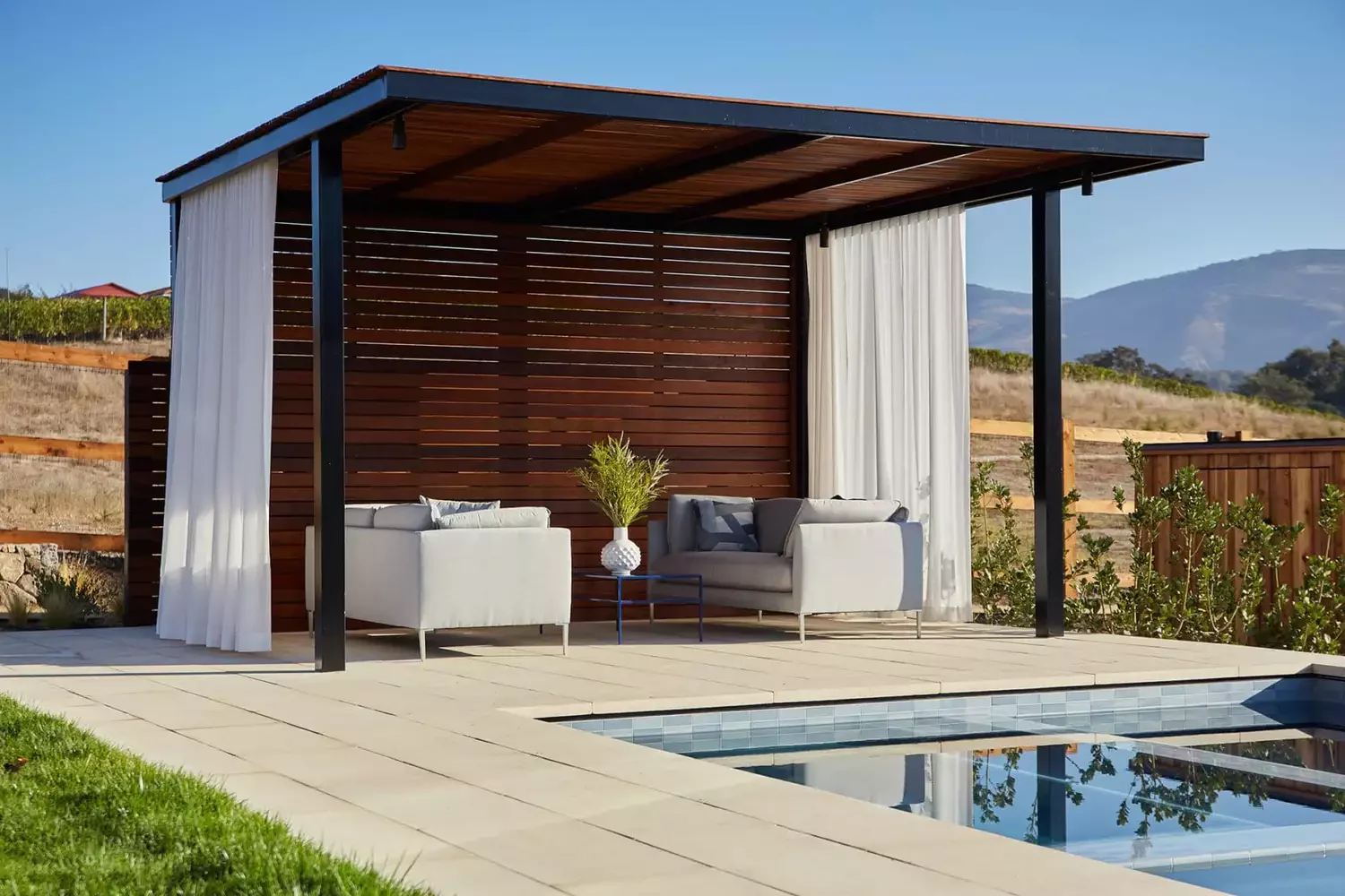 22 Stunning Pool Cabana Ideas to Transform Your Backyard Into a Luxury Resort 1 Pool Cabana With Curtains