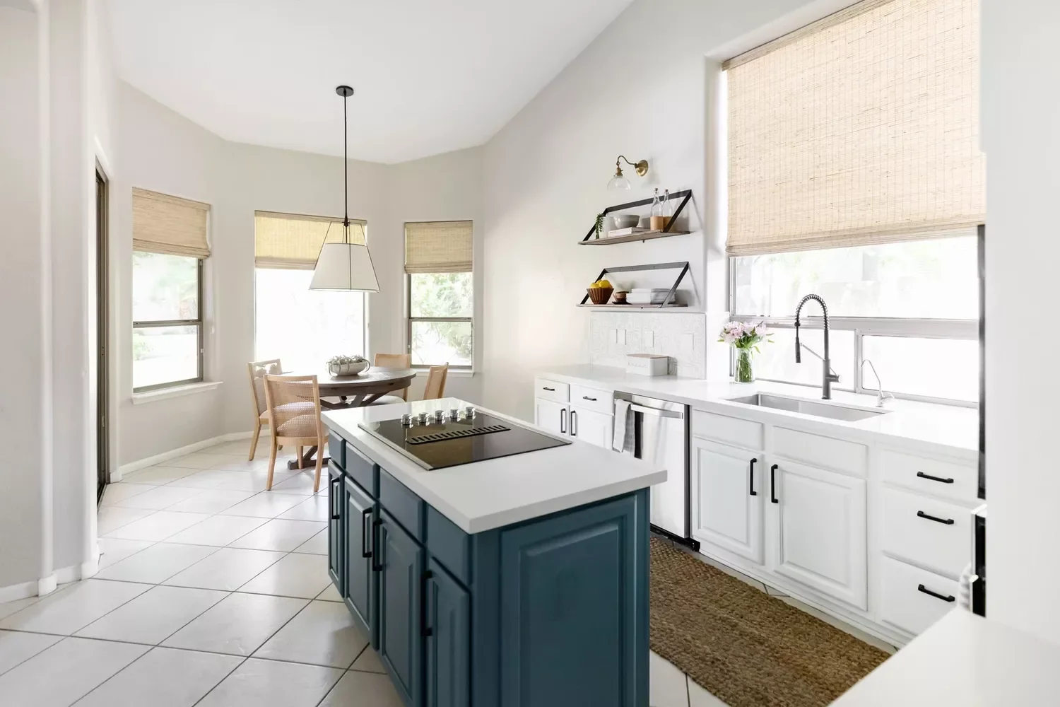 101 Kitchen Island Ideas That Will Transform Your Cooking Space 44 Pop of Color in an All-White Kitchen