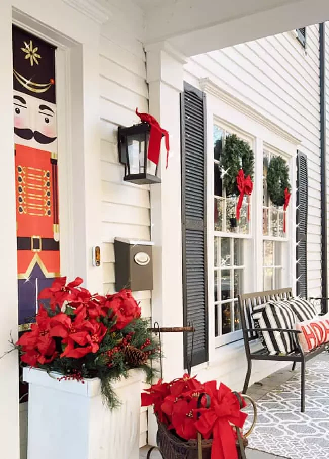 25 Stunning Christmas Lantern Ideas That'll Make Your Holiday Decor Absolutely Magical 24 Porch Light Bows