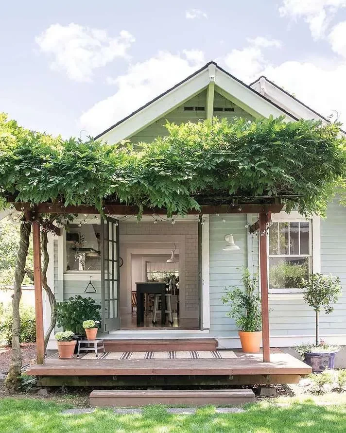 28 Stunning Porch Ceiling Designs That Will Transform Your Outdoor Space 11 Porch Roof With Lush Greenery