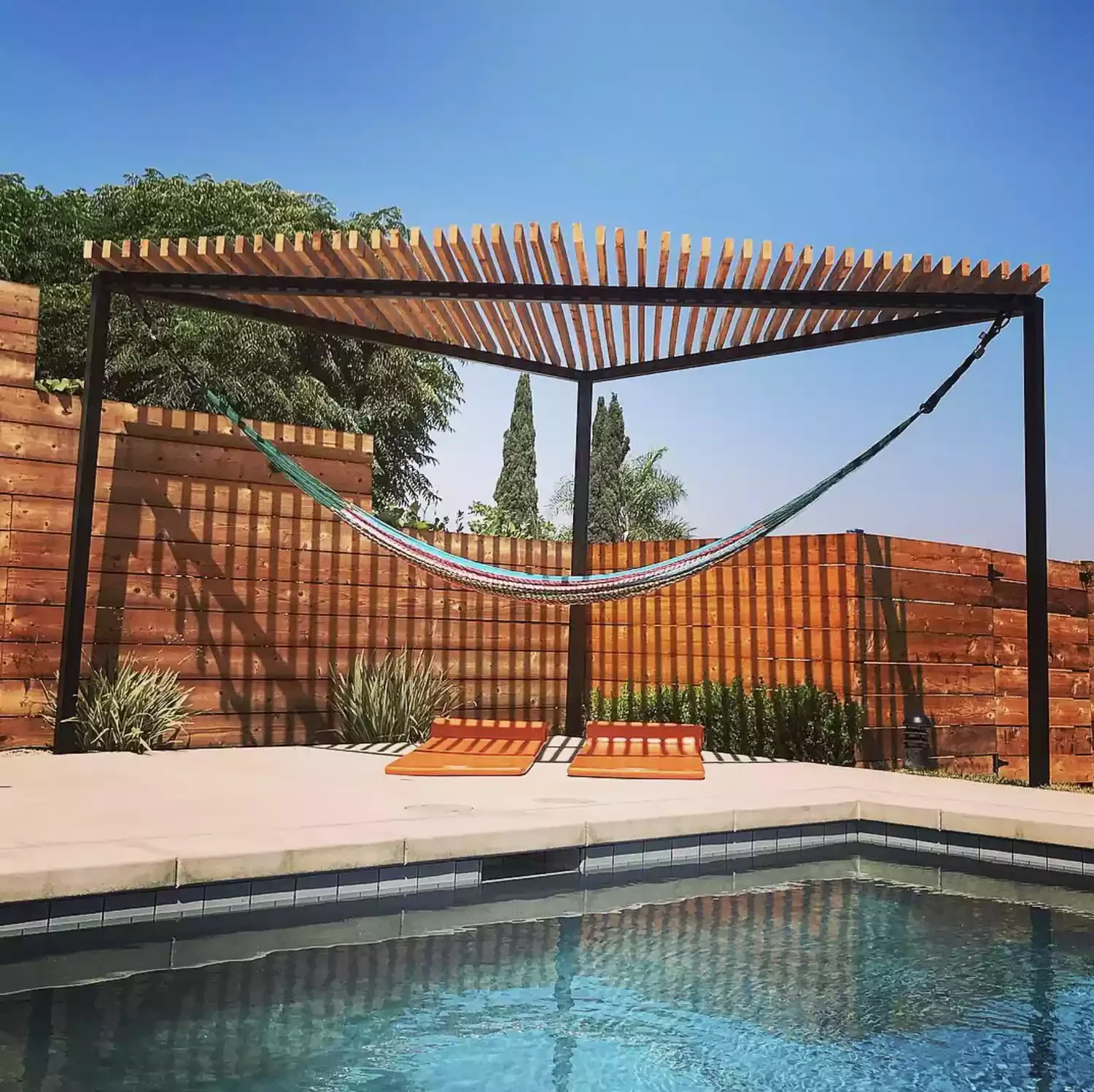 21 Creative Ways to Add Shade Around Your Pool Area 9 Position a Pergola Nearby