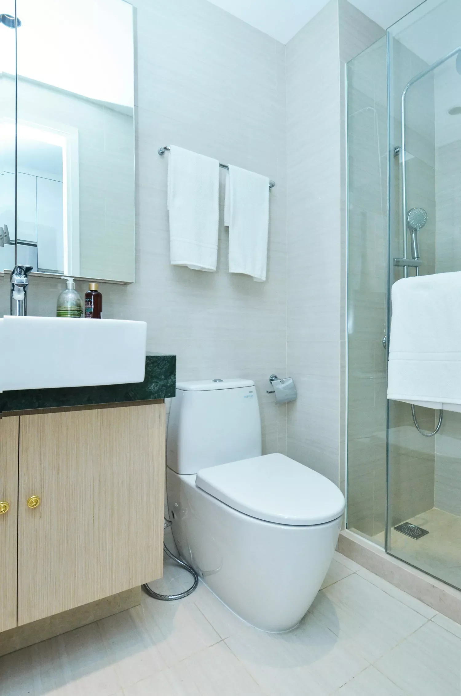 17 Brilliant Above-Toilet Storage Solutions That'll Transform Your Bathroom Prioritize Towel Storage
