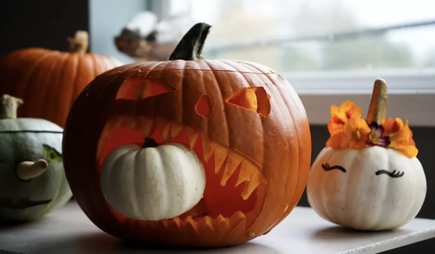 77 Creative Pumpkin Carving Ideas That'll Transform Your Fall Decorating Game 7 Pumpkin Eating a Pumpkin