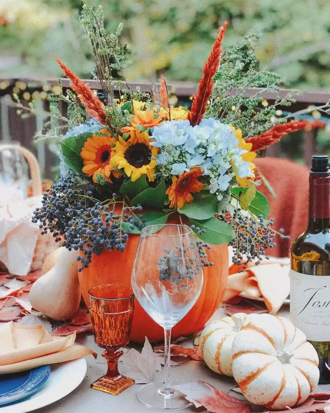62 Stunning Thanksgiving Table Ideas That Will Wow Your Guests 18 Pumpkin Floral Arrangement