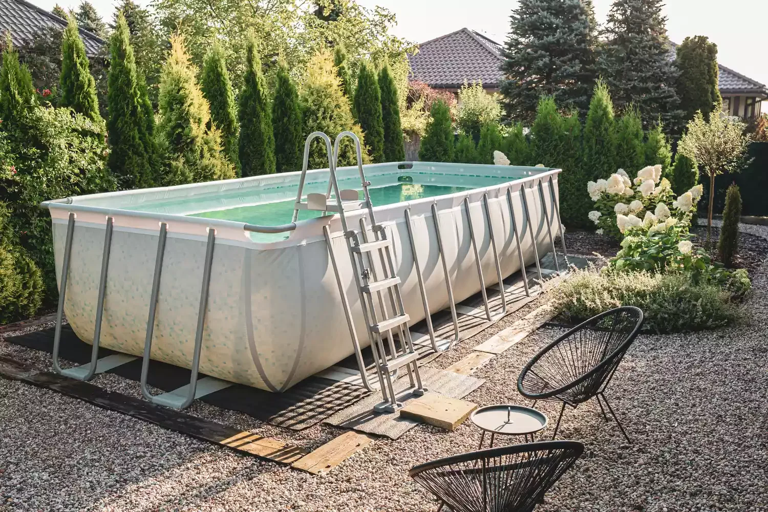 37 Brilliant Above-Ground Pool Deck Ideas That Won't Break Your Budget 2 Put Down Pea Gravel