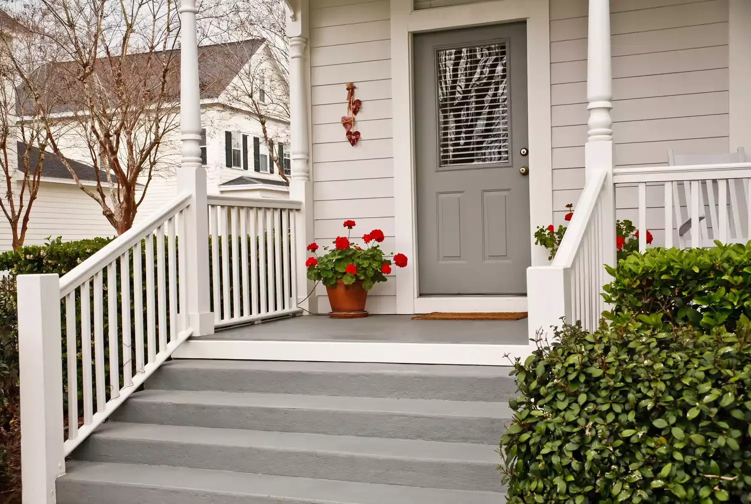 23 Budget-Friendly Front Yard Makeover Ideas That Will Wow Your Neighbors Put Out Pots of Flowers