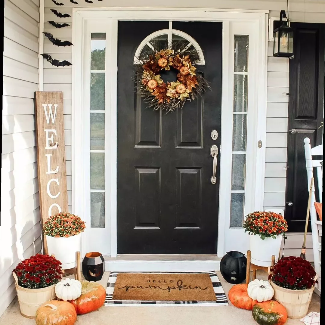 52 Autumn Front Porch Ideas That Will Transform Your Home's Entrance This Fall 9 Put Your Mums in Baskets