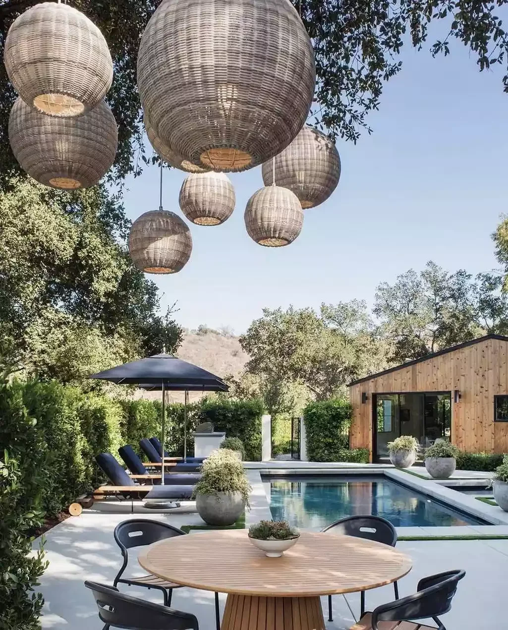 41 Stunning Outdoor Lighting Ideas That Will Transform Your Yard Into a Magical Space 20 Rattan Pendant Lights