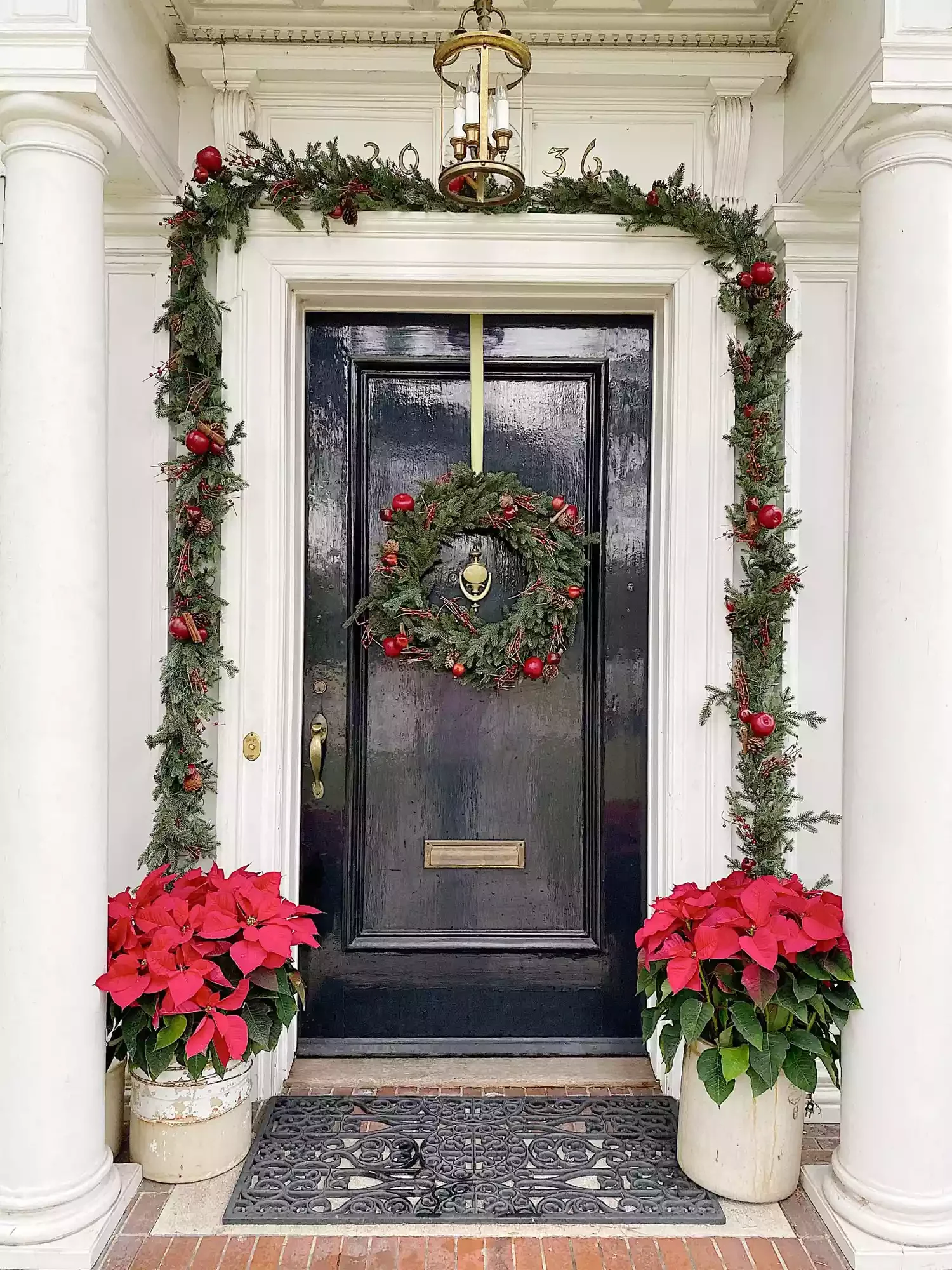 68 Christmas Front Porch Ideas That Make Your Home the Envy Red Poinsettias