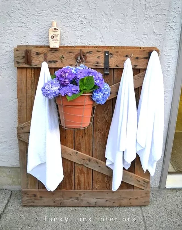30 Stunning Above-Ground Pool Ideas That'll Transform Your Backyard 18 Repurposed Pool Towel Hanger