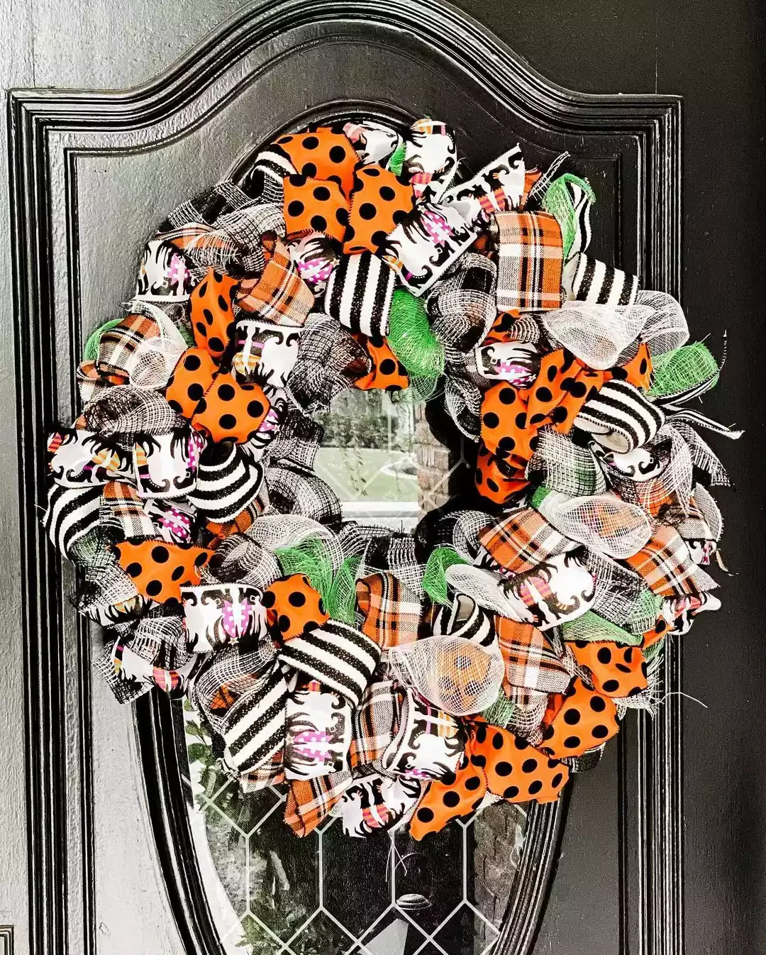 45 Spooktacular Halloween Wreath Ideas That Will Make Your Front Door the Neighborhood's Favorite Stop 3 Ribbon Halloween Wreath