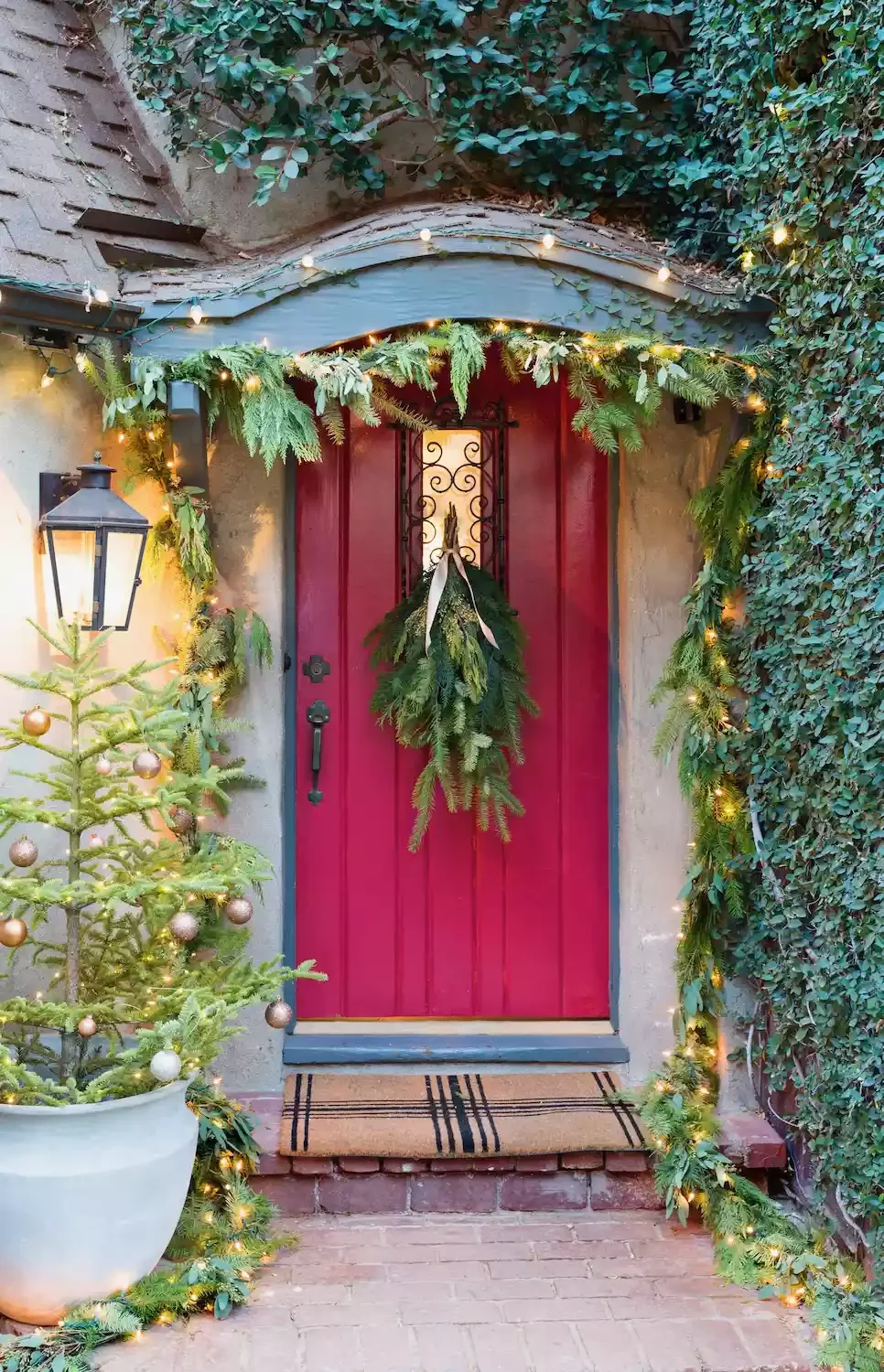 68 Christmas Front Porch Ideas That Make Your Home the Envy Ribbon-Tied Door Swag