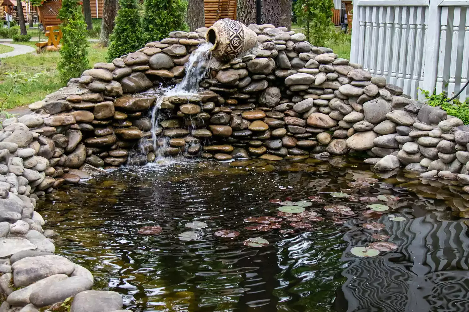24 Creative River Rock Ideas to Transform Your Outdoor Space River Rock Water Feature