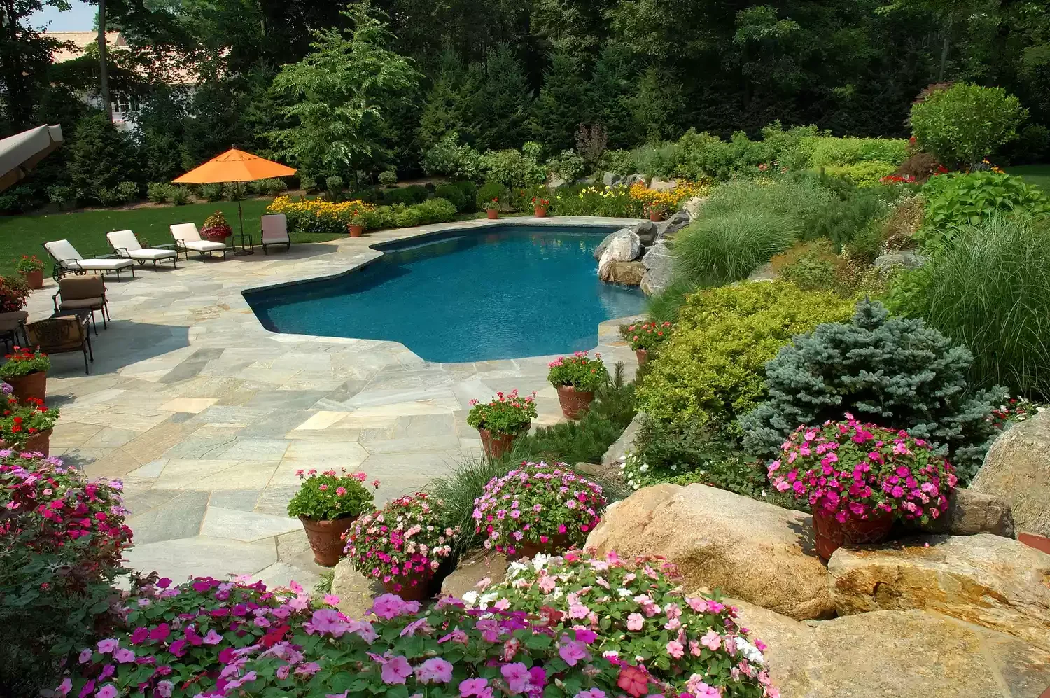 16 Pool Landscaping Ideas That Transform Your Area Rock Gardens