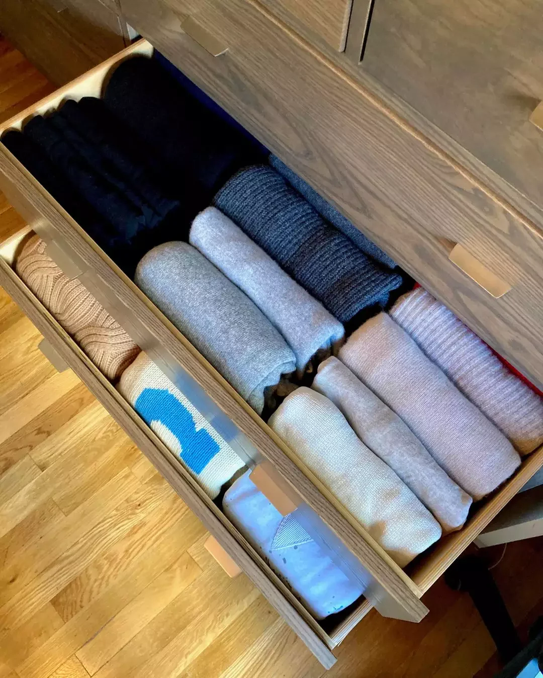 27 Brilliant Small Closet Organization Ideas That Actually Work Roll Clothes to Maximize Space