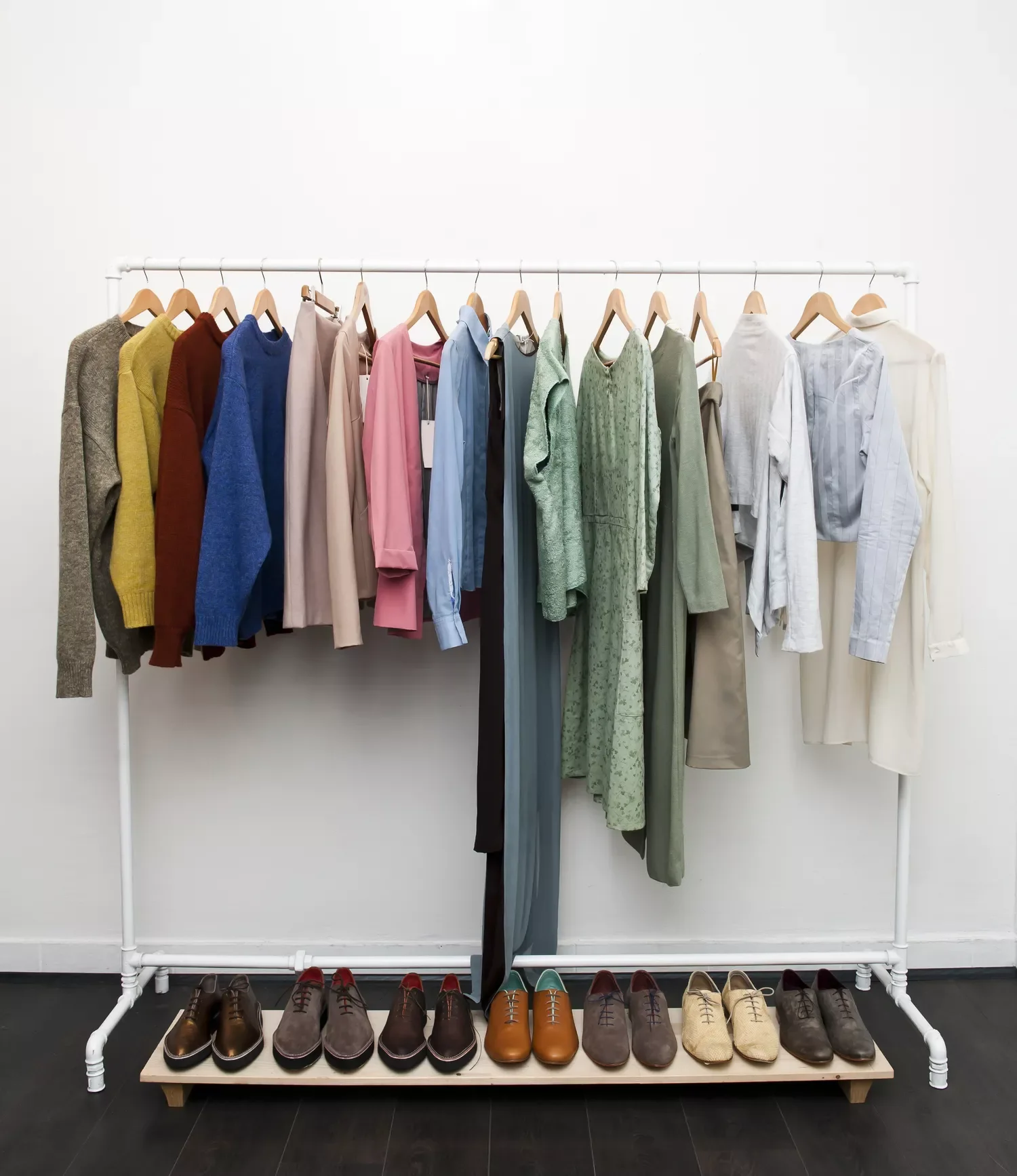 36 Smart Shoe Storage Solutions That Transform Cluttered Spaces Roll in a Clothing Rack