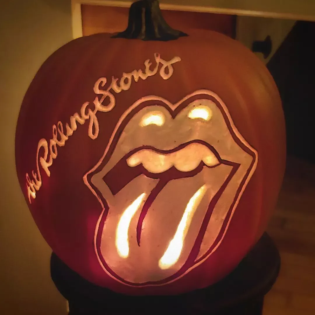 77 Creative Pumpkin Carving Ideas That'll Transform Your Fall Decorating Game 31 Rolling Stone Pumpkin