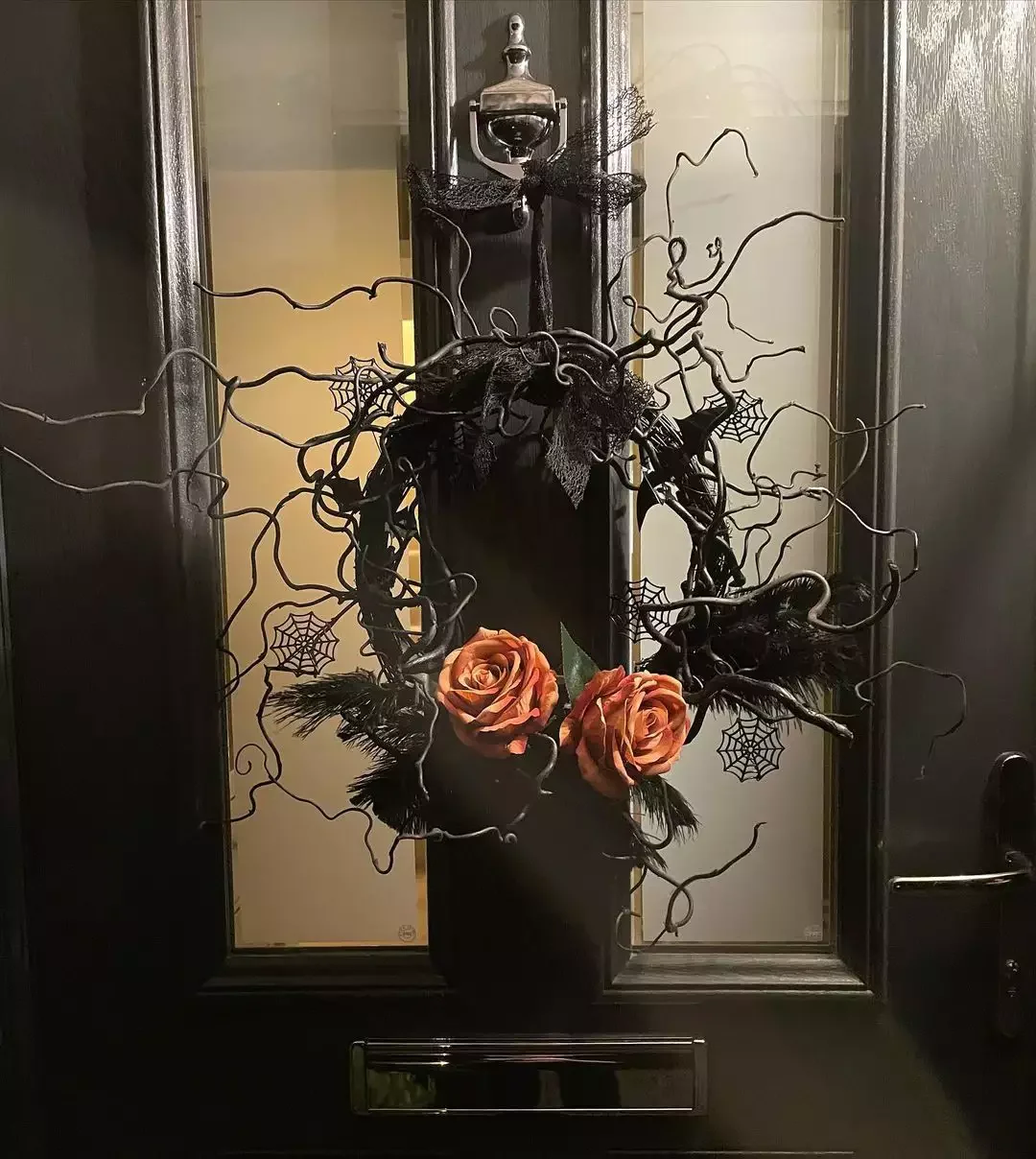 45 Spooktacular Halloween Wreath Ideas That Will Make Your Front Door the Neighborhood's Favorite Stop 16 Rose Halloween Wreath