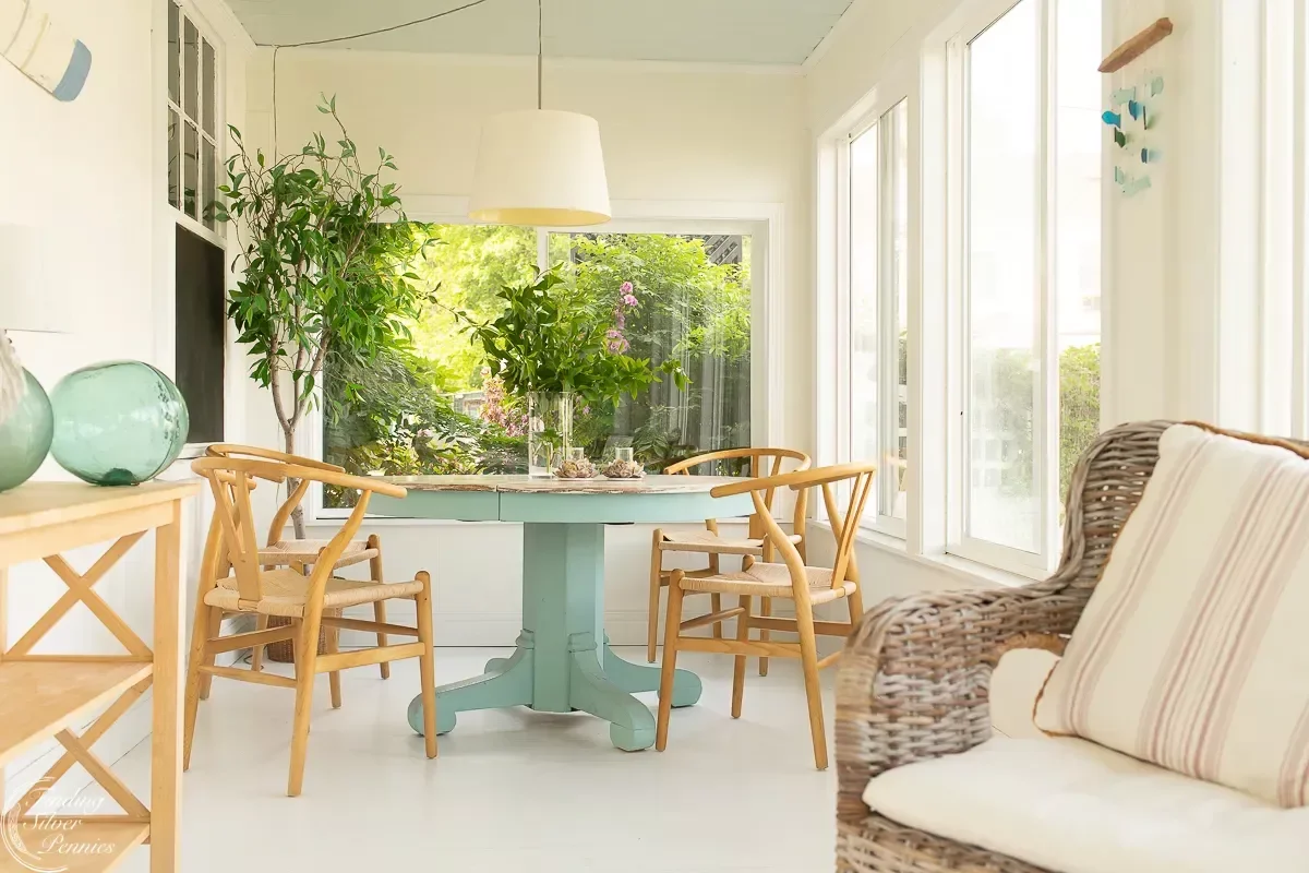 50 Stunning Sunroom Ideas That Transform Your Home Into a Light-Filled Paradise 41 Rotate Seasonal Decor