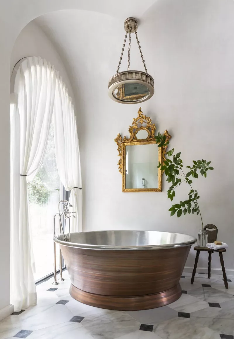 50 Luxurious Bathroom Ideas to Create Your Perfect Self-Care Sanctuary 46 Round Copper Bathtub