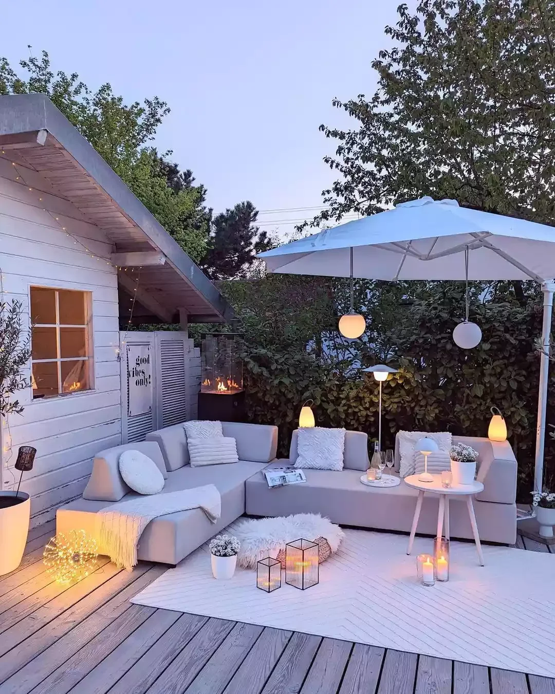 28 Budget-Friendly Privacy Fence Solutions That Transform Your Outdoor Space Row of Shrubs