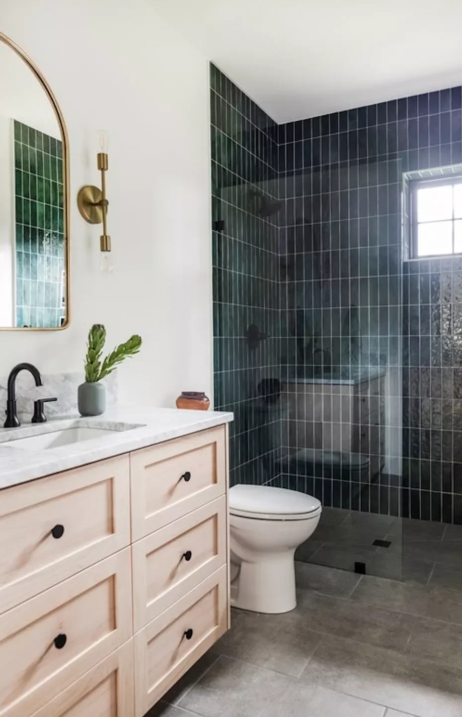 22 Clever Ways to Make Your Narrow Bathroom Feel Spacious and Stylish 19 Run Tile to the Ceiling