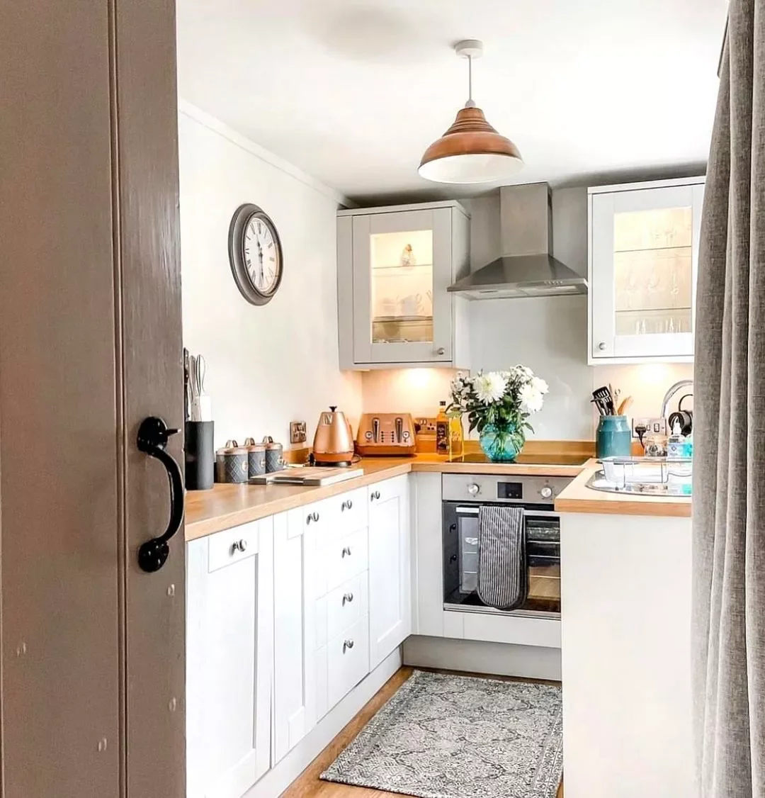 22 Budget-Friendly Small Kitchen Transformations That Create Maximum Impact 4 Section Off the Space With Curtains