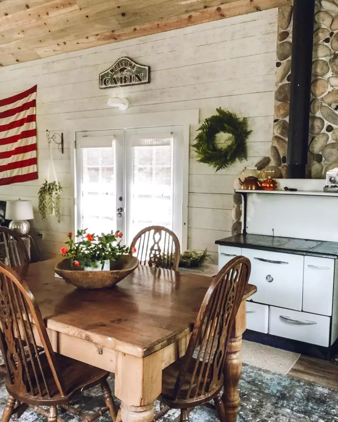 18 Cozy Cabin Kitchen Design Ideas That'll Make You Want to Move to the Mountains 3 Select a Large Wooden Dining Table