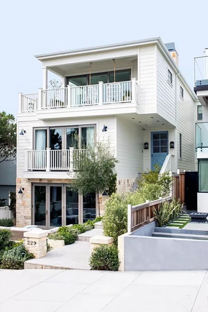 30 Stunning Porch Railing Designs to Transform Your Outdoor Space 26 Separating Two Properties