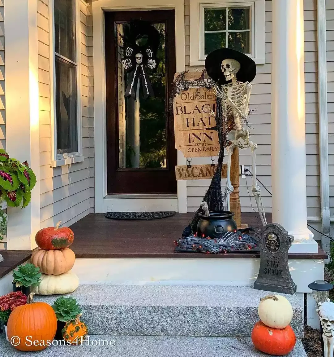 33 Spooktacular Halloween Front Porch Ideas That'll Make Your Home the Neighborhood's Must-See Destination 11 Set Up a Cauldron