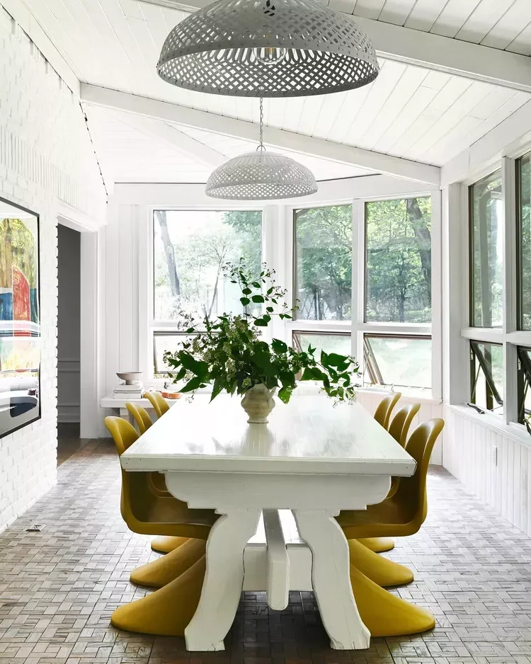50 Stunning Sunroom Ideas That Transform Your Home Into a Light-Filled Paradise 5 Set Up a Dining Table