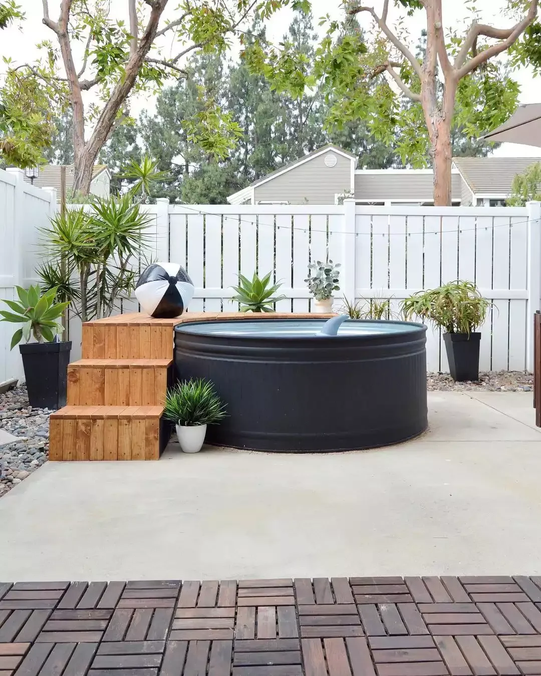37 Budget Backyard Ideas That Create a Stunning Retreat Set Up a Stock Tank Pool
