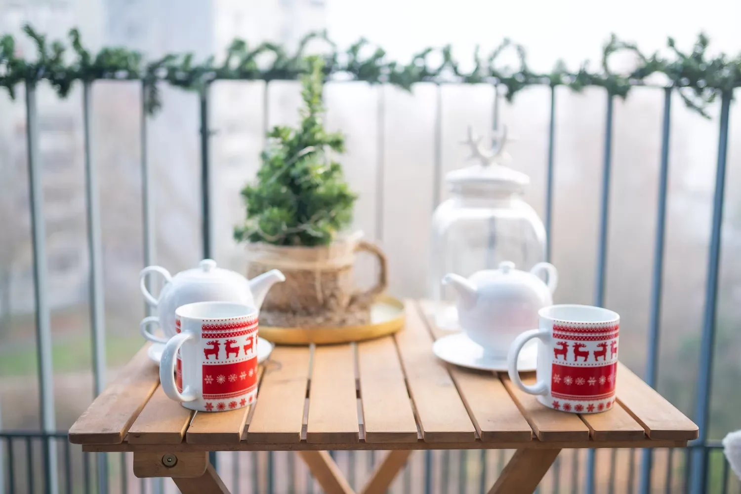 25 Christmas Balcony Ideas That Create a Holiday Wonderland Set a Holiday Tea Table
