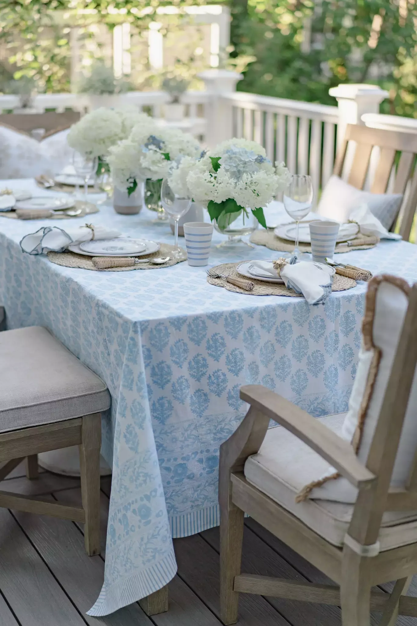 38 Charming Farmhouse Porch Ideas That Create the Perfect Welcome 28 Set a Welcoming Table