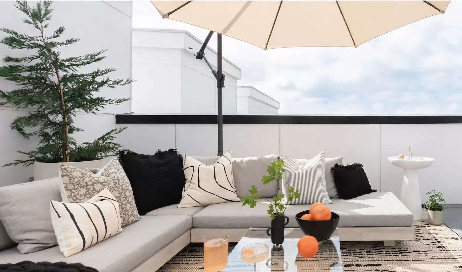 21 Creative Ways to Transform Your Apartment Patio Into an Outdoor Haven 2 Shade With an Umbrella