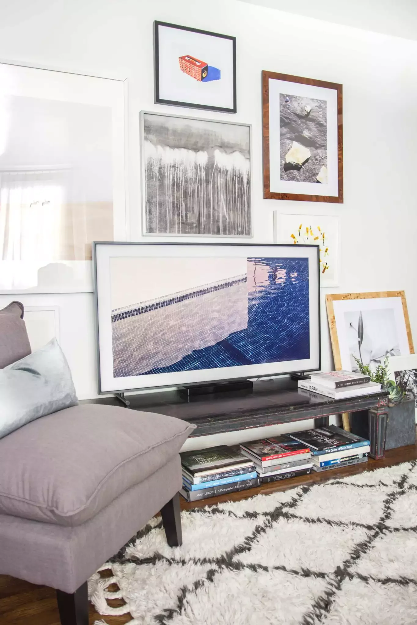 21 Beautiful Ways to Style Your TV Console Like a Pro 9 Show Off Your Books