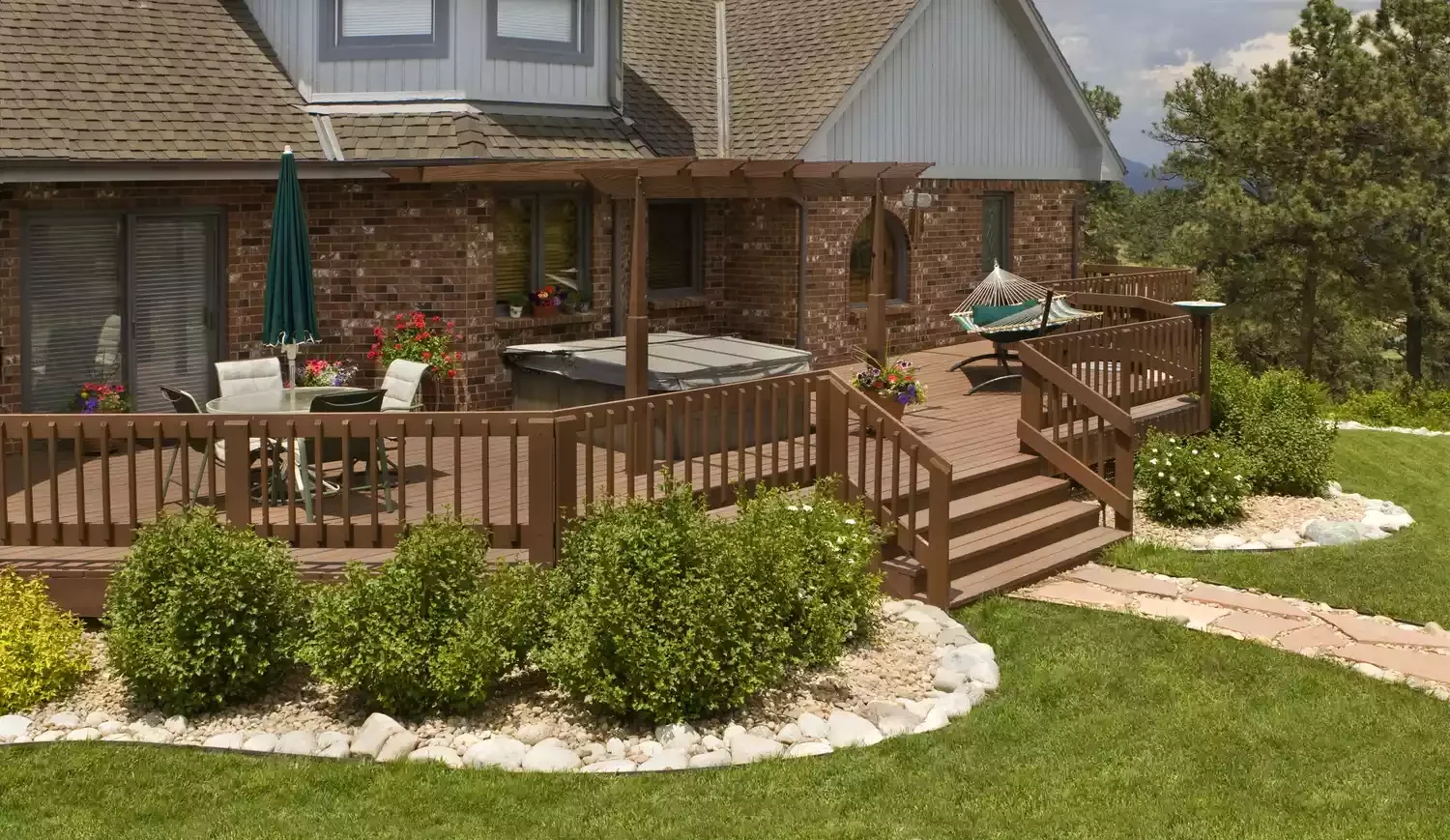 15 Creative Deck Skirting Ideas to Transform Your Outdoor Space 13 Shrub Deck Skirting