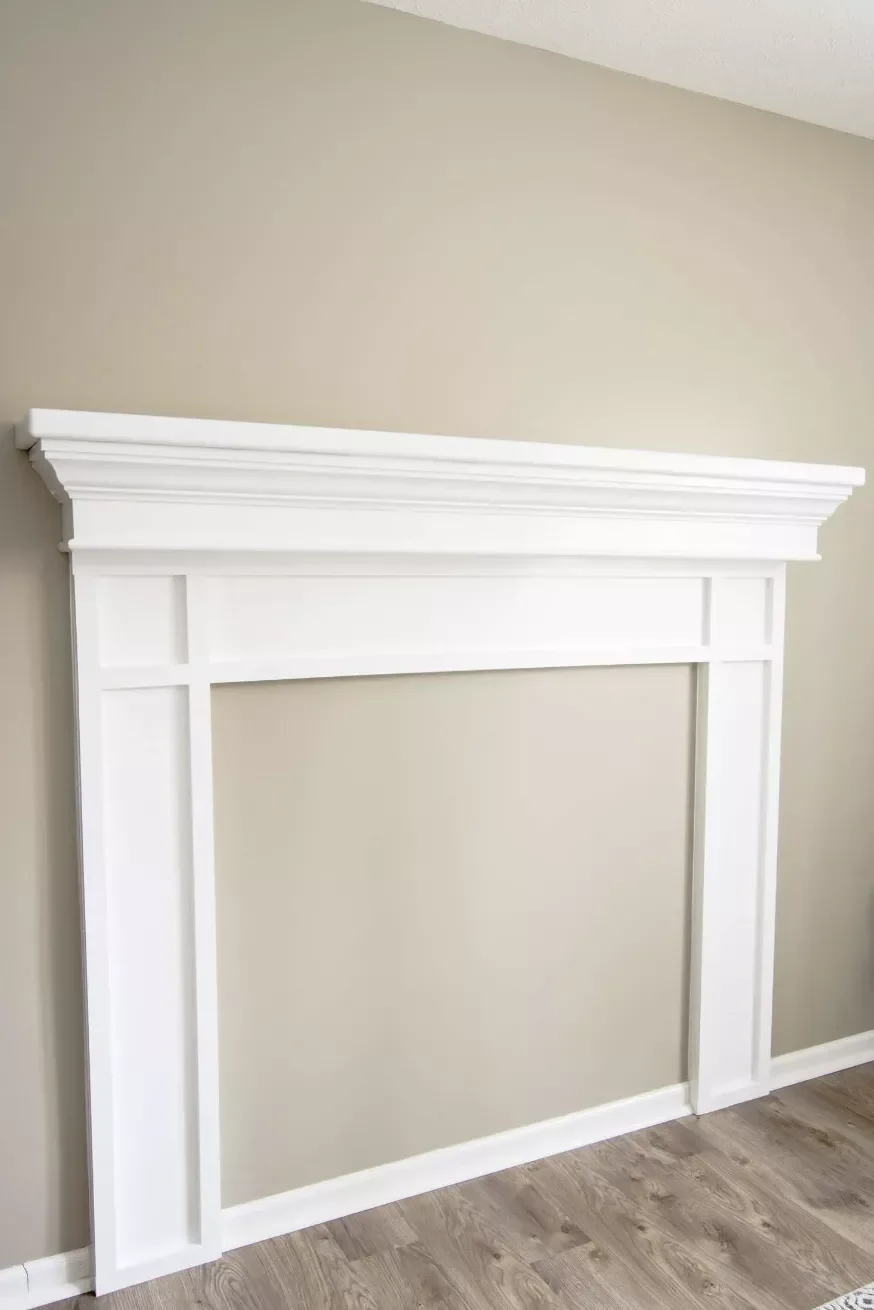20 Creative DIY Fake Fireplace Projects You Can Build This Weekend 16 Simple White Wooden Mantel