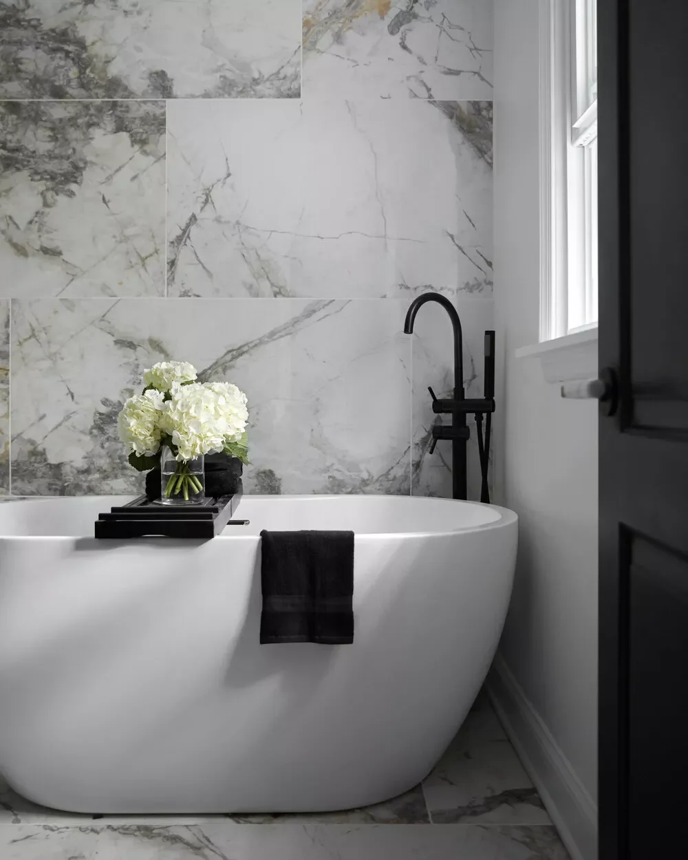 45 Sophisticated Bathroom Designs That Transform Your Home Into a Luxury Retreat 18 Simply Black and White