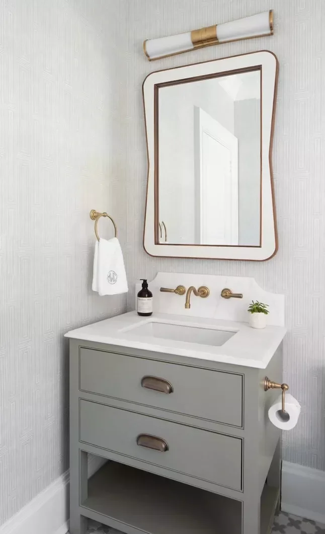 25 Compact Bathroom Vanity Ideas That Maximize Style and Storage 7 Single Vanity With a Toilet Paper Holder