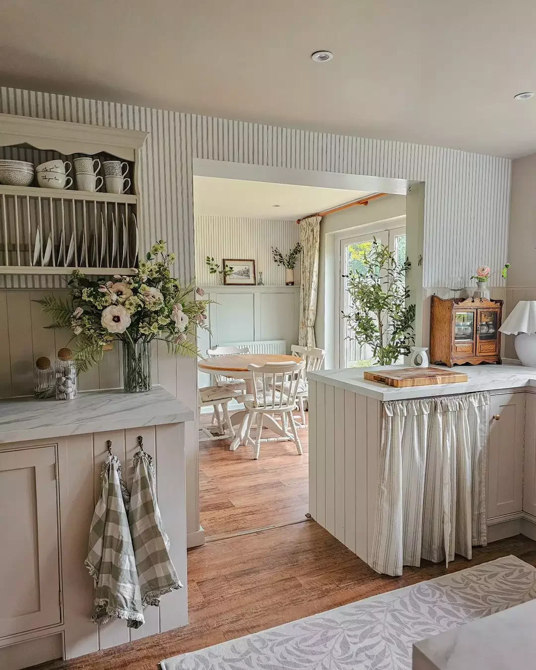 32 Charming Country Kitchen Ideas That'll Make You Never Want to Leave Your Cooking Space 2 Skirted Details