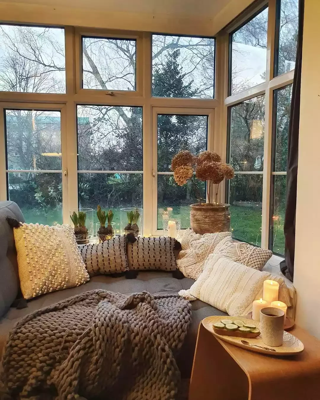 48 Cozy Small Sunroom Ideas That Will Transform Your Space 39 Small Sunroom Plant Display