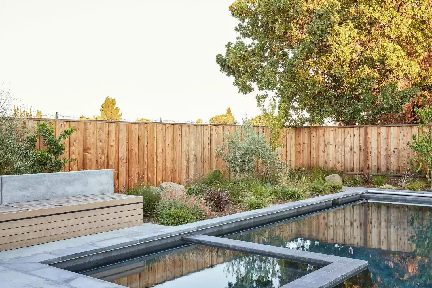 38 Stunning Pool Deck Designs for Your In-Ground and Above-Ground Swimming Pool 32 Soften With Landscaping