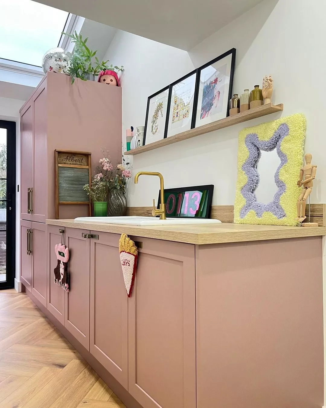 30 Stunning Pink Kitchen Designs That Show Why Pink Is the Ultimate Neutral 12 Soften With Woven Decor
